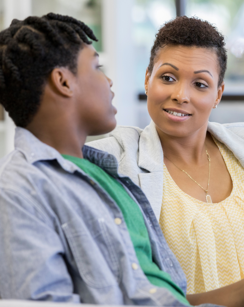 Parent speaking to teenager 