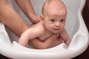 newborn baby in the bath 