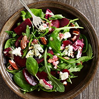 beet salad with greens and nuts