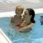 Mom and child in swimming pool
