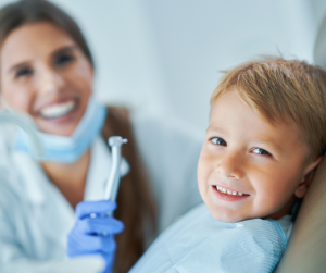 smiling kid at the dentist